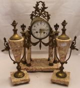 A marble mounted clock garniture