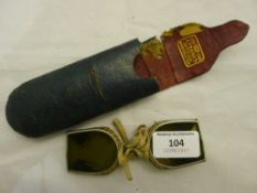 A pair of early steel framed tinted folding spectacles,