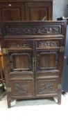 A 19th century Chinese carved cabinet