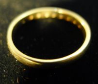 A 9 ct gold half eternity ring