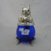 A silver plated and glass biscuit jar in the form of a squirrel