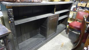 A Victorian carved oak bookcase