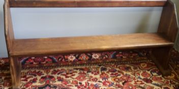 A child's pine pew