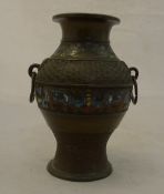 A small brass cloisonne vase