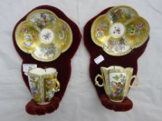 A pair of 19th century Dresden cup and saucers