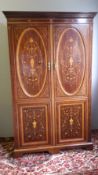 A Victorian/Edwardian inlaid mahogany wardrobe