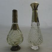 Two 19th century Continental silver mounted cut glass scent bottles