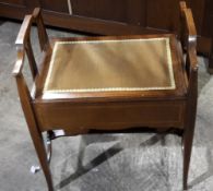 An Edwardian mahogany piano stool