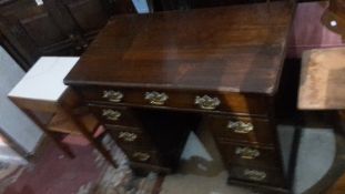 A 19th century mahogany knee hole desk