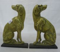 A pair of brass dog form heath ornaments
