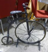 A small model of a penny farthing