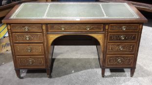 An Edwardian inlaid mahogany desk (adapted)