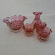 Five pieces of Victorian cranberry glass