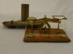 A set of postal scales and a brass ink stand