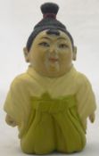 A small Japanese wooden figure