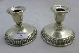 A pair of silver candlesticks