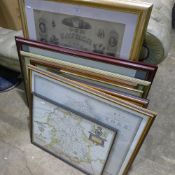 A quantity of framed prints and maps