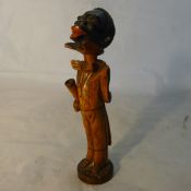 A pipe in the form of a standing Negro,