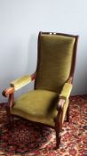 A 19th century mahogany framed upholstered open armchair