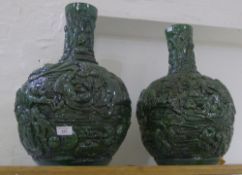 A pair of large Chinese green glazed pottery vases