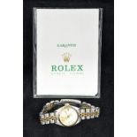 A Rolex lady's stainless steel and gold oyster perpetual watch With twenty-eight jewel movement,