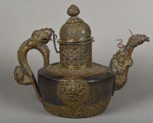 A large 19th century Tibetan copper mounted wooden beer kettle The mounts embossed,