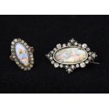 A paste mounted silver brooch Centred with a painted miniature of courting couple,