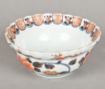 An 18th century Chinese porcelain bowl Of crimped flared footed form decorated in the Imari palette.