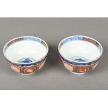 A pair of Japanese porcelain bowls Decorated in the Imari palette,