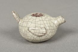 A Chinese Ming porcelain Ge type water dropper Modelled as a stylised bird with allover creamy grey