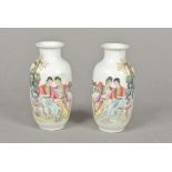A pair of Chinese Republic period porcelain vases Each depicting female figures reading in a garden,