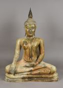 A large 19th century Asian bronze figure of a seated Buddha Worked in Bhumisparsha Mudra with