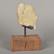 An antique Egyptian carved stone fragment Carved with the head of a Pharaoh,