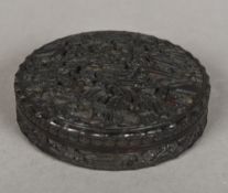 A 19th century Cantonese carved tortoiseshell snuff box Of lidded circular form,