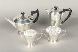 An Art Deco silver plated four piece tea set Each piece of stepped conical design.