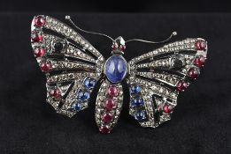 An unmarked yellow and white metal rose diamond set brooch Formed as a butterfly with pierced wings