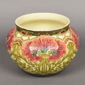 A Mintons Secessionist jardiniere With printed and tube lined floral decoration,