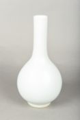 A Chinese porcelain bottle vase With allover celadon glaze,