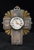 An unmarked silver and silver gilt pocket watch In the form of a cross,