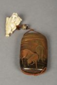 A Japanese lacquered five section inro Decorated with horses at sunset;