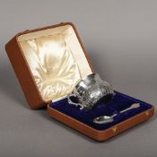 A George V cased Christening set Comprising: a twin handled bowl with embossed acanthus decorations