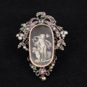 A 19th century Renaissance style gem set gilded white metal mourning pendant Worked en grisaille