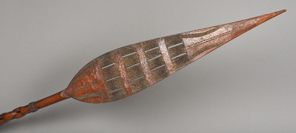 A late 19th/early 20th century African carved wooden tribal paddle,