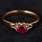 A Russian gold and ruby solitaire ring The exterior of the shank stamped for Moscow and 583 purity