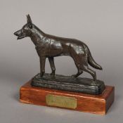 An early 20th century German patination bronze animalier group Formed as an Alsatian,