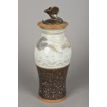 An Art pottery vase and cover Decorated with a mountainous landscape, in the Japanese manner,