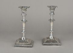 A pair of George II silver candlesticks, hallmarked London 1759,