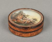 A 19th century burrwood and tortoiseshell circular box and cover Inset with a well painted