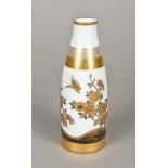 A late 19th century Japanese Kutani sake bottle The white ground with gilt bands and decorated with