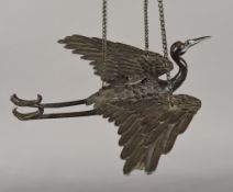 A Japanese Meiji period bronze censor Formed as a crane in flight,